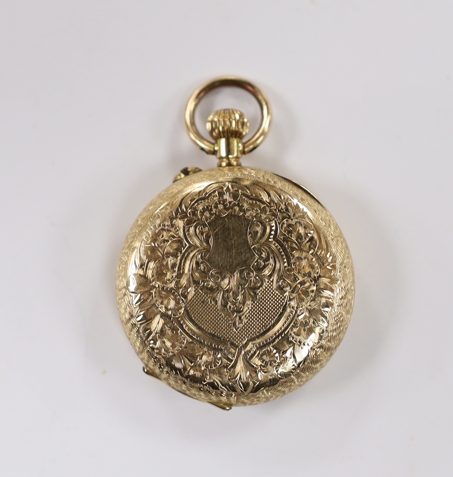 A lady's continental engraved 14k open face keyless fob watch, with Roman dial, gross weight 27.8 grams.